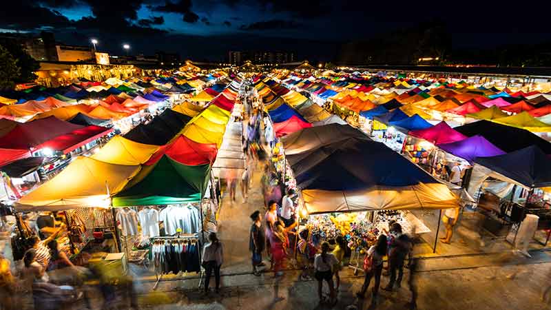  A night market, one of the many places to go in Bangkok that Visa recommends